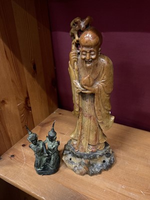 Lot 121 - Chinese soapstone carving and Tibetan bronze