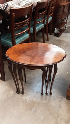 Lot 1414 - Nest of three walnut occasional tables