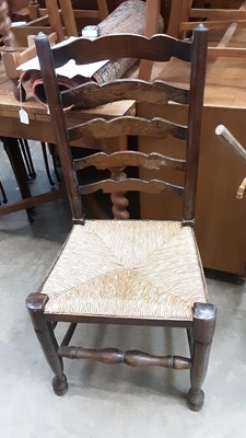 Lot 1415 - Antique oak ladderback chair with rush seat