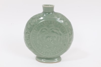 Lot 284 - A Chinese celadon glazed moon flask