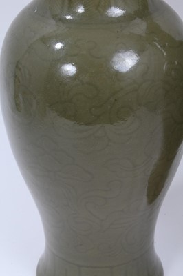 Lot 48 - A pair of Chinese dark celadon glazed vases