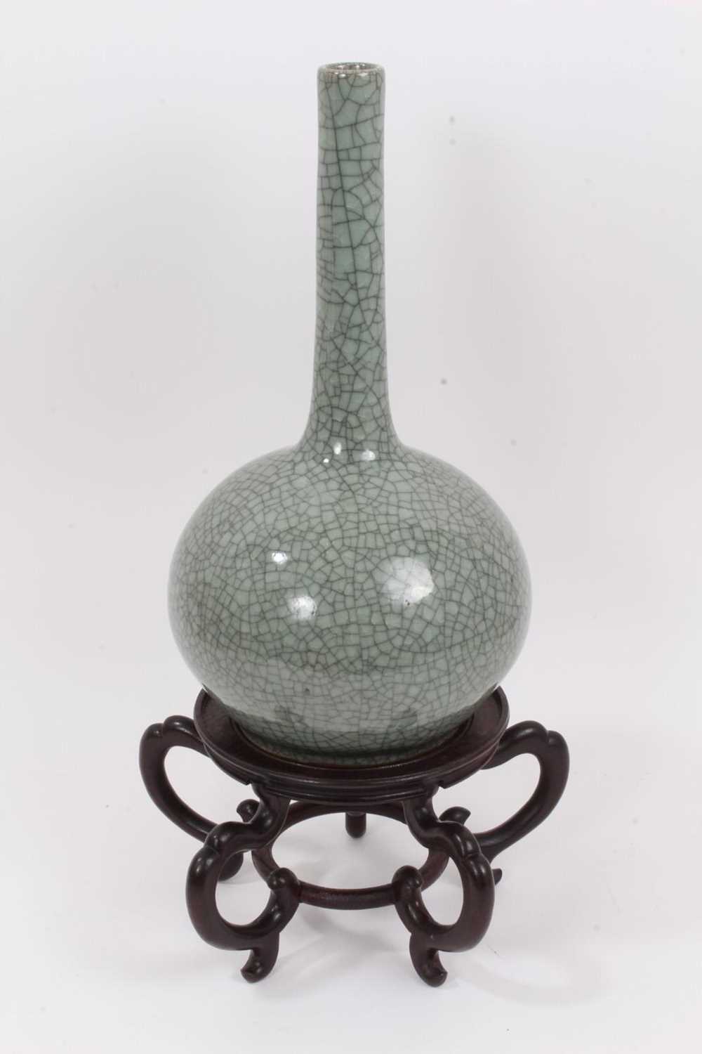 Lot 49 - An Oriental celadon crackle glazed bottle vase