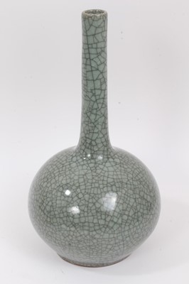 Lot 49 - An Oriental celadon crackle glazed bottle vase