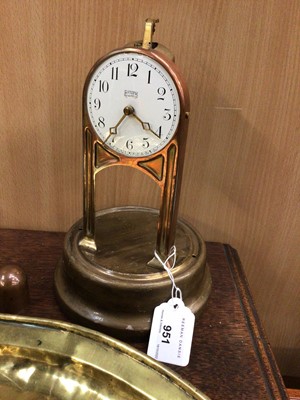 Lot 951 - Tiffany clock, with a brass Keswick dish and a brass candlestick