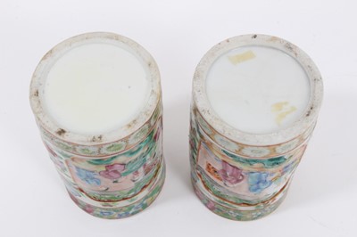 Lot 282 - A pair of Chinese Canton famille rose porcelain brush pot, 19th century