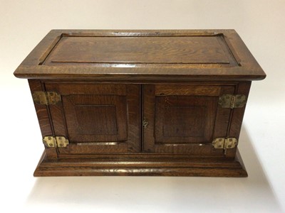 Lot 246 - Edwardian oak collectors cabinet