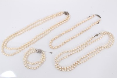 Lot 749 - Cultured pearl two-strand necklace and matching bracelet, and two other cultured pearl necklaces (4)