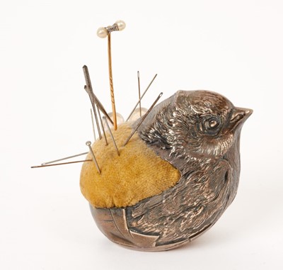 Lot 425 - Large Edwardian silver pin cushion, modelled in the form of a chick