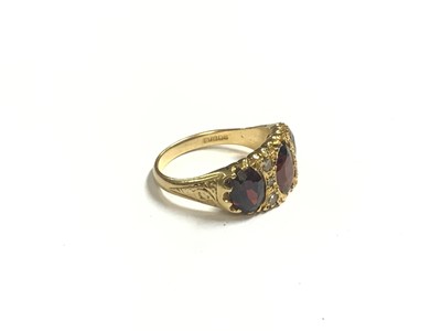 Lot 47 - Victorian style 18ct gold garnet and diamond ring