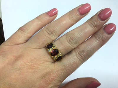 Lot 47 - Victorian style 18ct gold garnet and diamond ring
