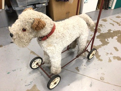 Lot 443 - Vintage push a long dog on wheels