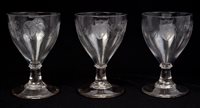 Lot 32 - Three George III rummers, each engraved with...