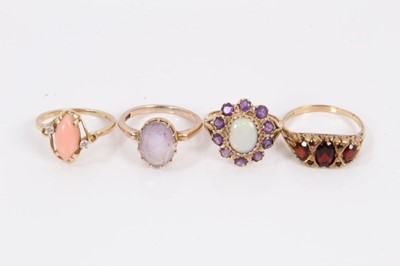 Lot 205 - 14ct gold coral and diamond ring, 9ct gold garnet ring, 9ct gold opal and amethyst ring and one other gem set ring