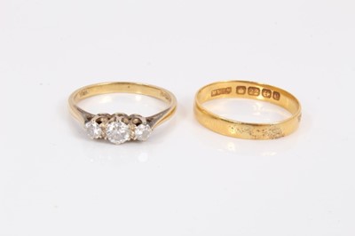 Lot 207 - 18ct gold diamond three stone ring and 22ct gold wedding ring