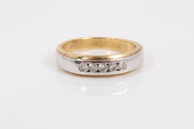 Lot 208 - Diamond five stone ring on yellow and white gold band