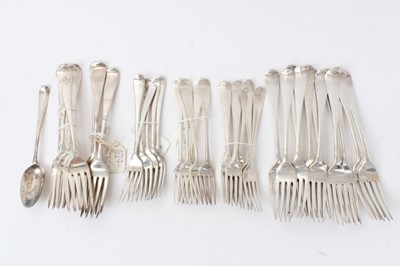 Lot 441 - Large group of silver Georgian and later Hannoverian pattern table and dessert forks, together with one dessert spoon (Various dates and makers). All at approximately 64ozs. (Qty)