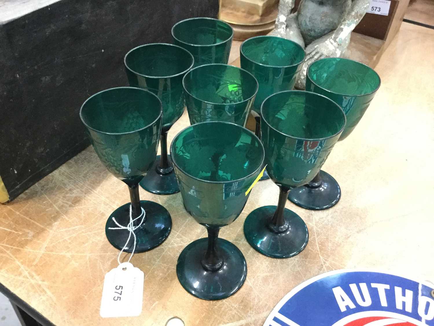 Lot 575 - Eight 19th century Bristol green wine glasses with etched decoration.