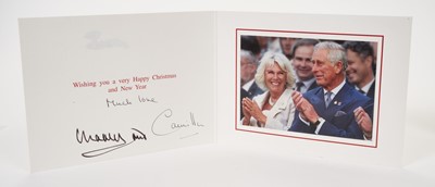 Lot 32 - T.R.H.Prince Charles and The Duchess of Cornwall (now T.M.King Charles III and The Queen Consort), hand signed and inscribed 2014 Christmas card with twi gilt ciphers to cover, colour photograph o...