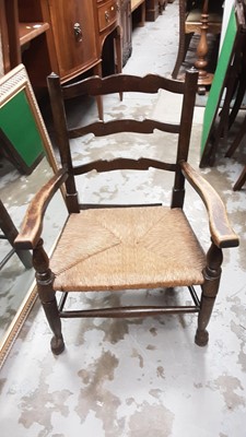 Lot 1430 - Oak ladderback nursing chair with rush seat