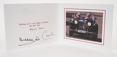 Lot 33 - T.R.H.Prince Charles and The Duchess of Cornwall (now T.M.King Charles III and The Queen Consort), hand signed and inscribed 2019 Christmas card with twi gilt ciphers to cover, colour photograph o...