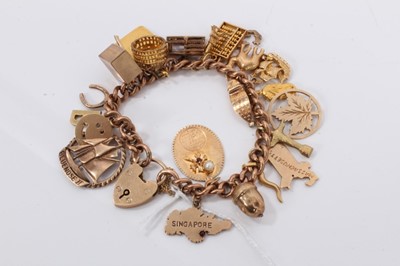 Lot 801 - Gold charm bracelet