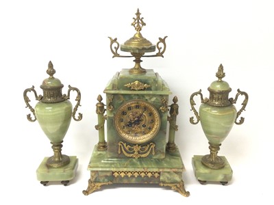 Lot 878 - Late 19th century onyx mantel clock garniture