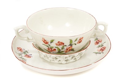Lot 262 - A Derby two handled cup and trembleuse saucer, circa 1758