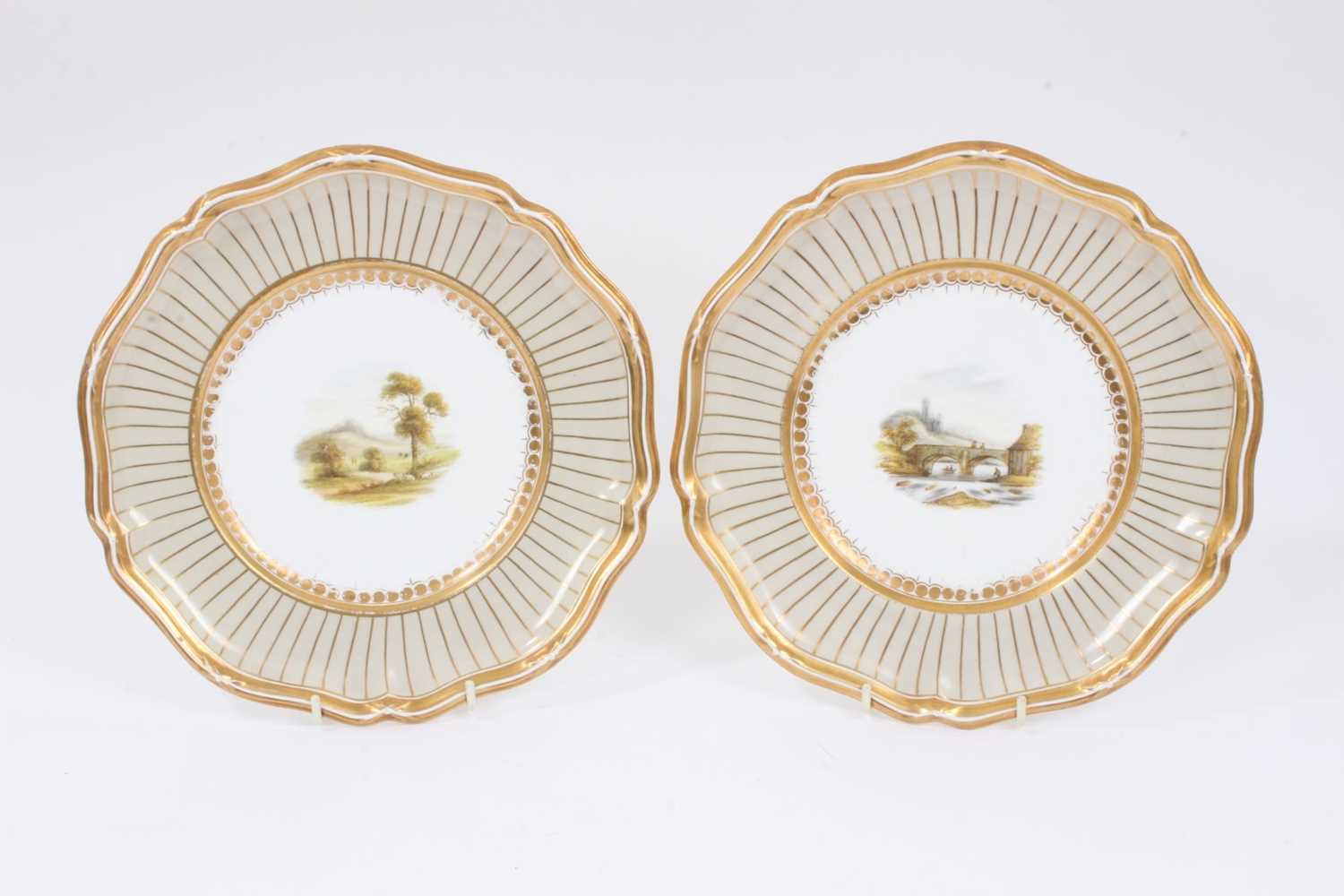 Lot 298 - A pair of Davenport plates, painted with landscapes, circa 1840-45