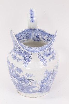 Lot 13 - An unusual blue printed Lavinia pattern helmet shaped jug
