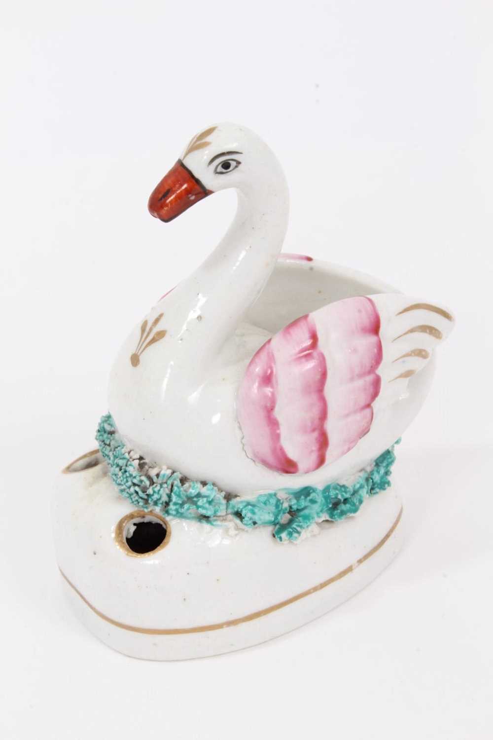 Lot 125 - A 19th century Staffordshire pottery swan form inkwell