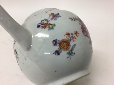 Lot 310 - A rare Chinese famille rose teapot and cover, the underside inscribed with the name of an English porcelain repairer and dated