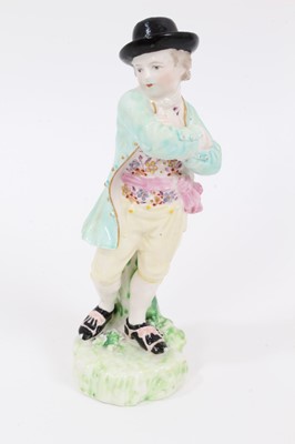 Lot 312 - A Derby figure of a young man, emblematic of Winter, circa 1780