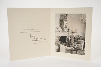 Lot 51 - H.M.Queen Elizabeth The Queen Mother, signed 1956 Christmas card with gilt crown to cover, photograph of The Queen Mother in the drawing room at Clarence House to the interior, signed 'from Elizabe...