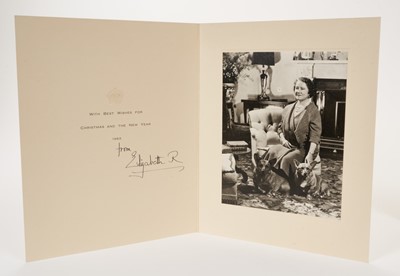 Lot 56 - H.M.Queen Elizabeth The Queen Mother, signed 1963 Christmas card with gilt crown to cover, photograph of The Queen  Mother with two corgis to the interior, signed 'from Elizabeth R'. Provenance: gi...