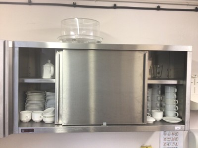 Lot 33 - A stainless steel double sliding door wall cabinet, 1200 mm wide x 340 mm deep