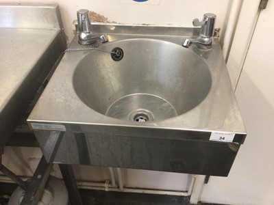 Lot 34 - A Sissons stainless steel wash basin with taps