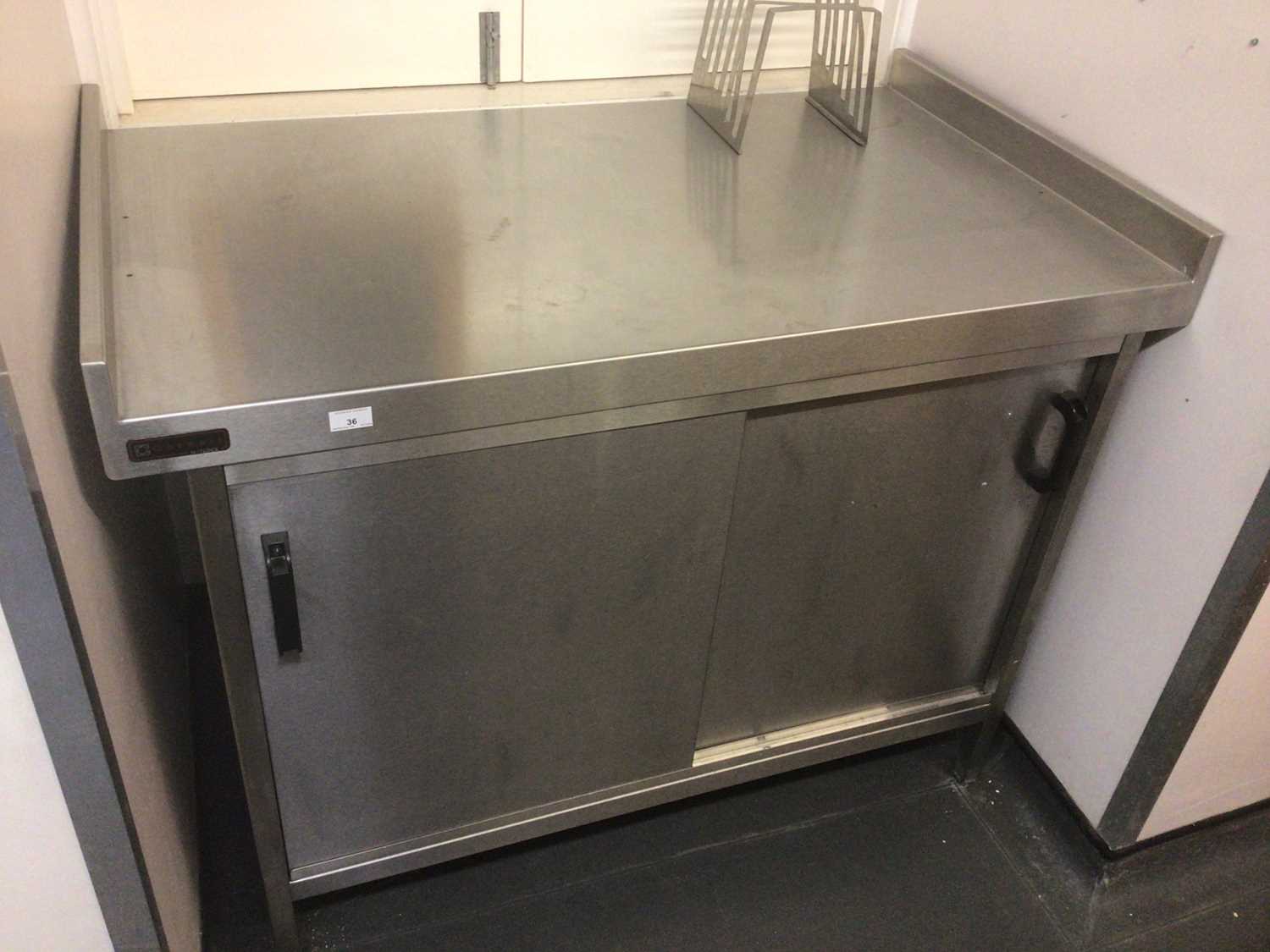Lot 36 - A Corsair Hotlock stainless steel preparation bench, with double sliding doors, 1210 mm