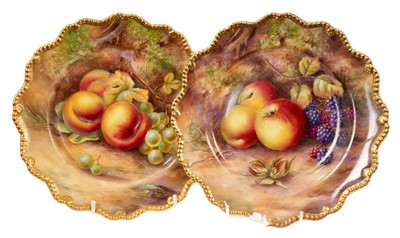 Lot 241 - A pair of Royal Worcester plates painted with fruit, signed by H.H. Price, 22.5cm across