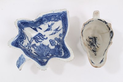 Lot 246 - A group of 18th century English blue and white porcelain, including a Lowestoft cream jug, Worcester and Caughley