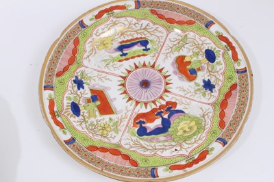 Lot 249 - An 18th century Chelsea plate, decorated with exotic birds, together with two Worcester plates (3)