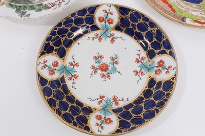 Lot 249 - An 18th century Chelsea plate, decorated with exotic birds, together with two Worcester plates (3)