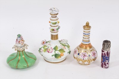 Lot 909 - Three Victorian porcelain scent bottles including a Rockingham china bottle and stopper, and a silver mounted porcelain scent bottle