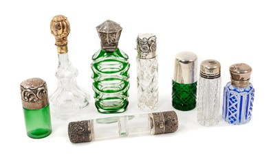 Lot 911 - Group of silver mounted scent bottles