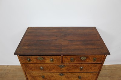 Lot 1400 - Good early 18th century burr walnut and feather banded chest, with two short over three long graduated drawers on bracket feet, 100cm wide x 61cm deep x 92cm high