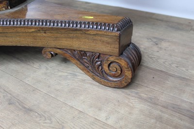 Lot 1401 - William IV rosewood circular breakfast table, the tilt top with beaded edge on facetted column and shaped triangular platform on scroll feet, 123cm diameter