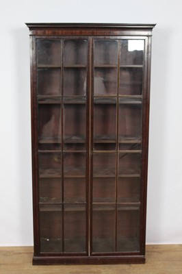 Lot 1402 - 19th century mahogany floorstanding bookcase, with pair of glazed doors on plinth base, 89cm wide x 30cm deep x 180cm high