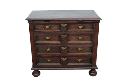 Lot 1411 - Late 17th century oak geometric moulded chest, with four long drawers each with early brass fittings, on bulbous bun feet, 98cm wide x 53cm deep x 91cm high