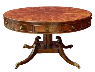 Lot 1491 - Good 19th century flame mahogany library drum table