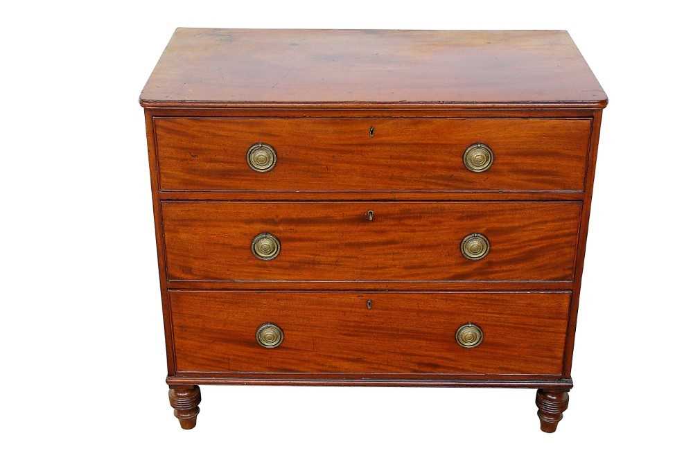 Lot 1417 - Regency mahogany chest of drawers with three long graduated drawers on spool feet, 94cm wide x 50cm deep x 84cm high