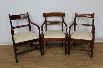 Lot 1419 - Three Regency mahogany bar back open armchairs